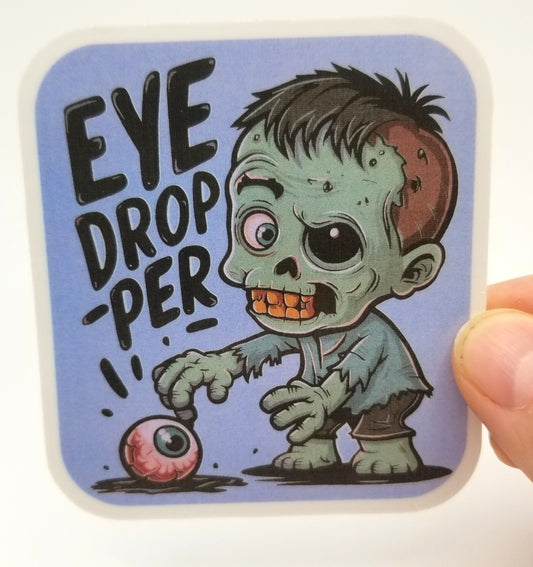 Eye dropper zombie vinyl sticker 3 inches, water resistant decal, funny zombie, cute zombie, zombie missing an eye, eyedropper, pun sticker